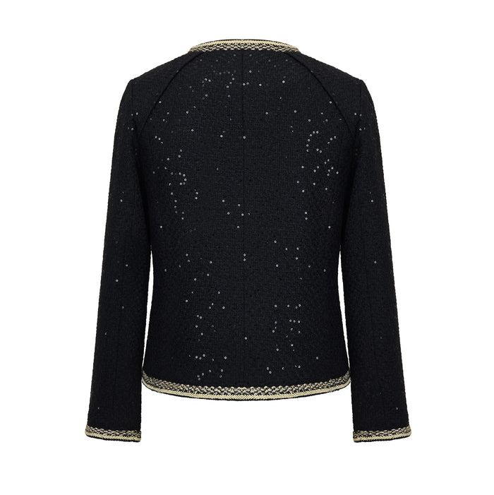 Back view of the black sequin tweed jacket with trim at the neckline, cuffs and hem